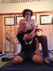 Steve treating a client with Shiatsu